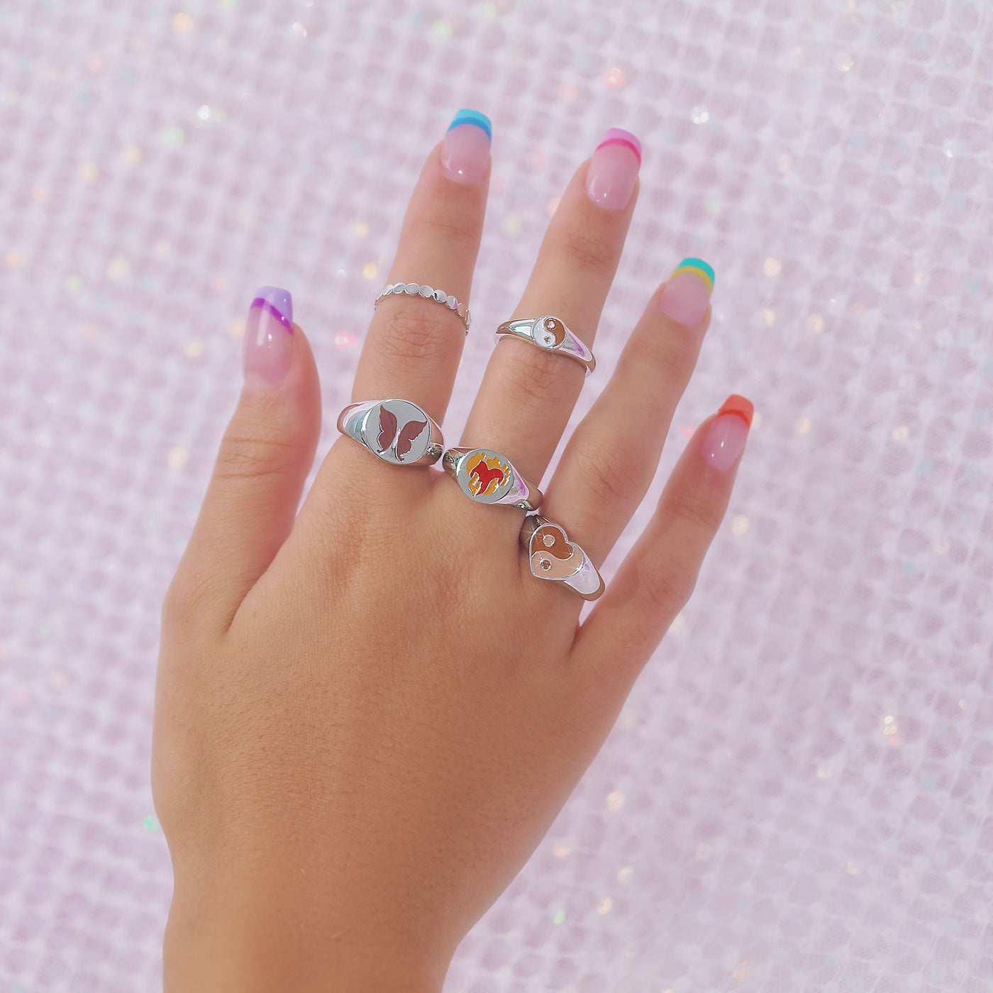 2 SIZE 5 SILVER RINGS SS