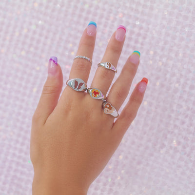 2 SIZE 5 SILVER RINGS SS